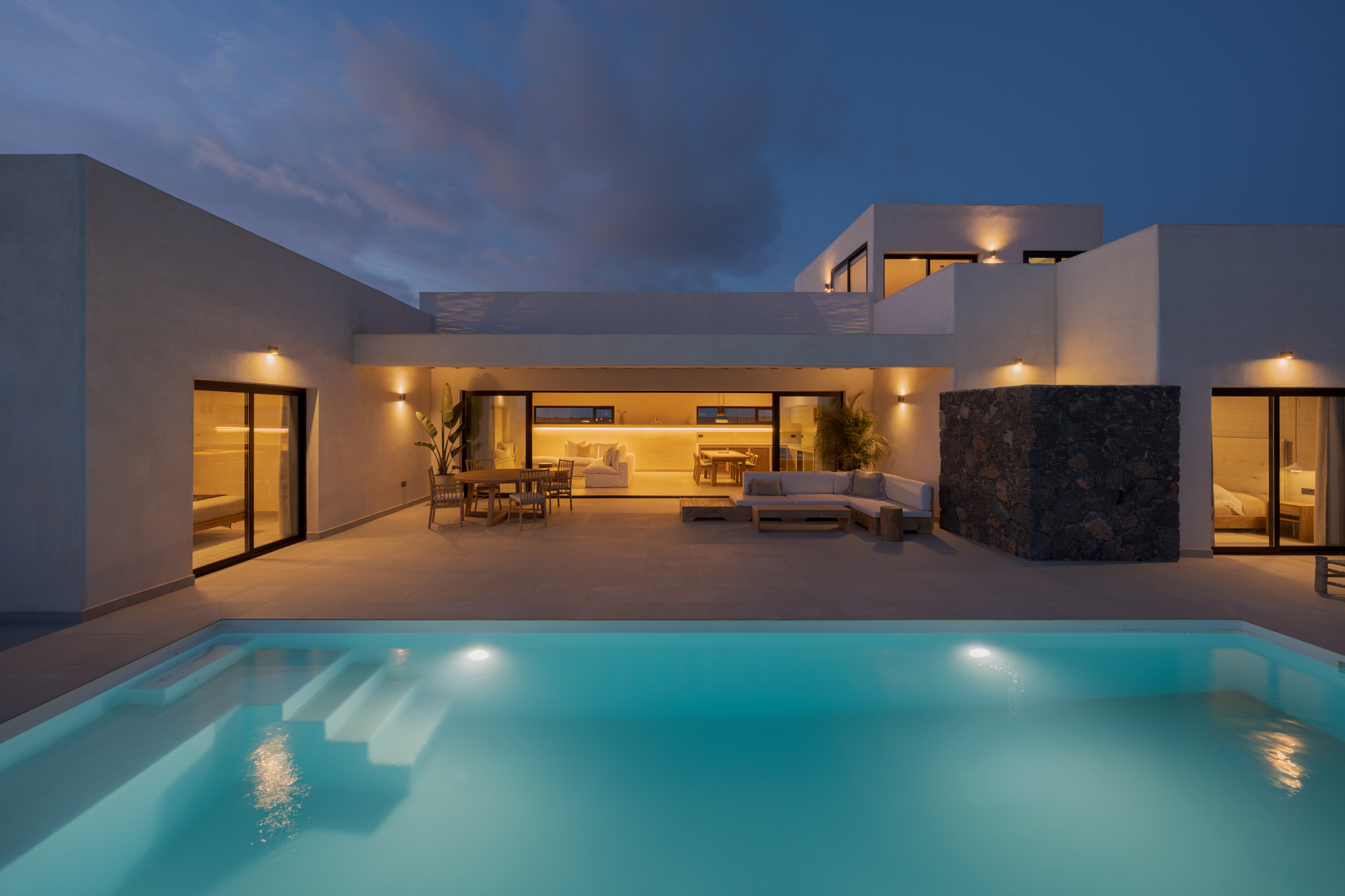 Villa Victorina El Roque illuminated at evening with pool